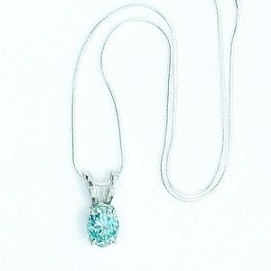 5.33 Carat Blue Moissanite Oval Pendant And Necklace